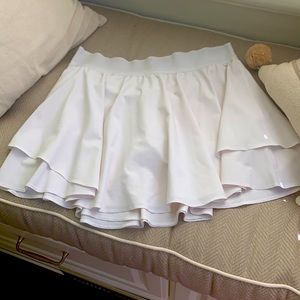 Court rival white Lululemon tennis skirt.